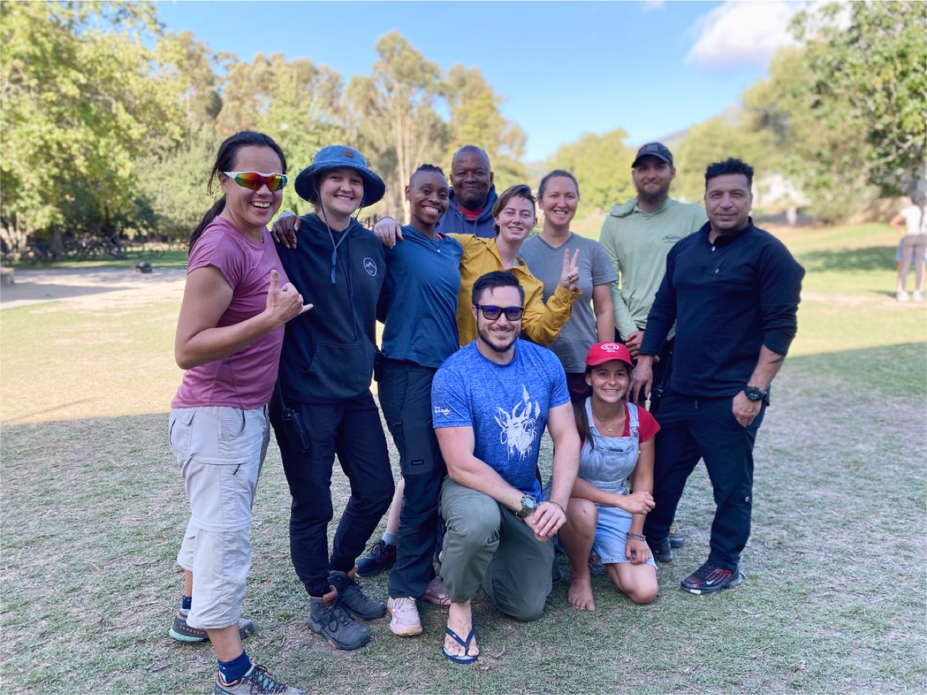 A diverse outdoor practitioner community gathered together